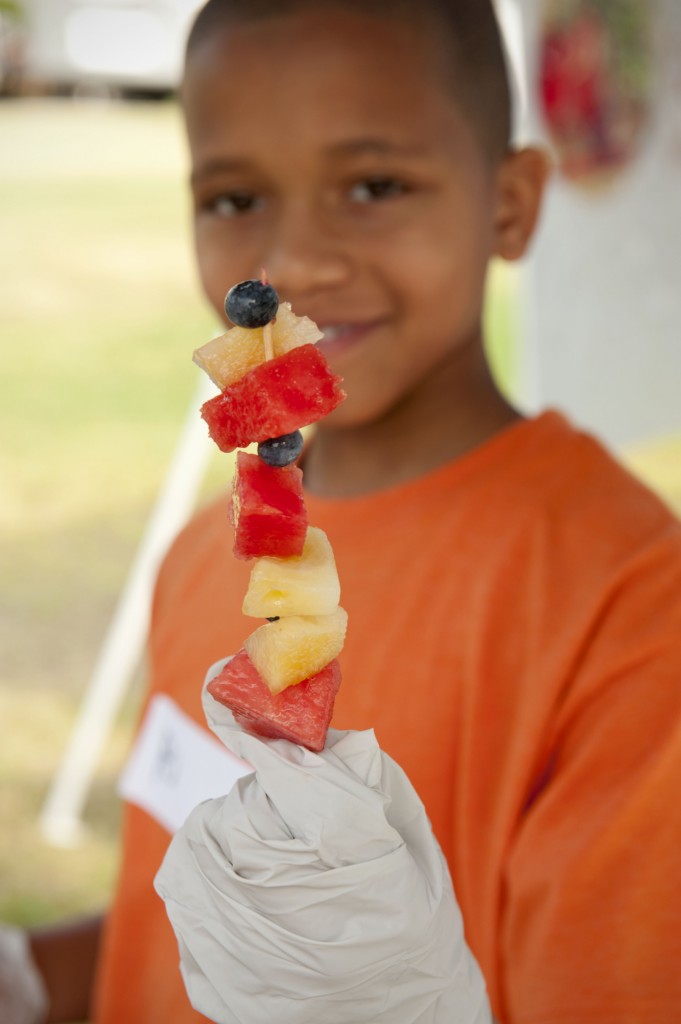 Individual Fruit Skewers prepared by the HomeFries Team at the Durham Farmers' Market. Photo Copyright Casey Boone: www.caseyboonephotography.com