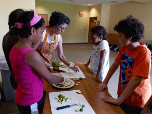 group cutting up veggies UNC Wellness Center